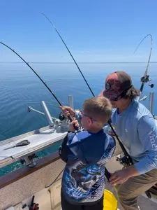 Two people enjoying a fishing tour in Minnesota
